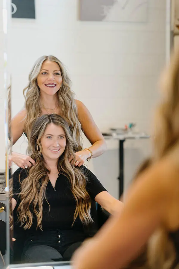 Long blonde extensions styled
