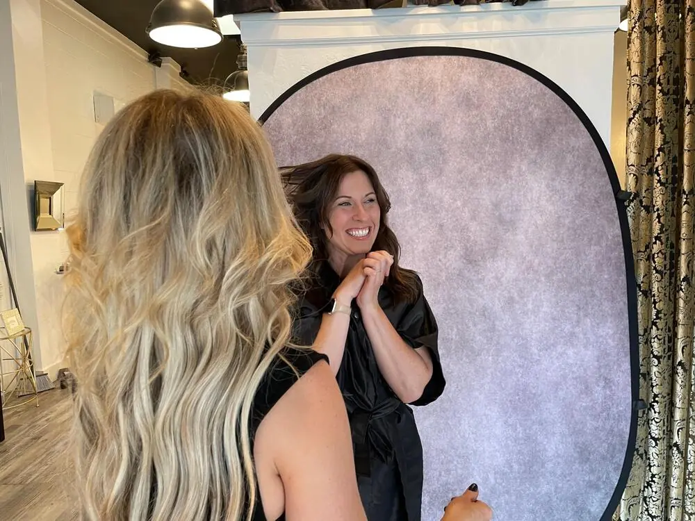 Long blonde color and extensions by Salon Bilancio