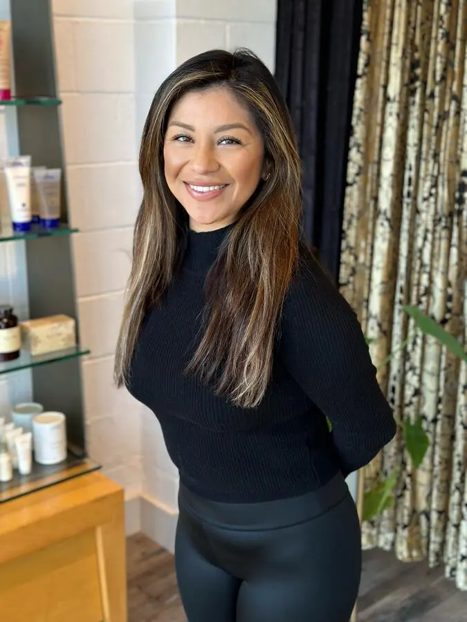 Guest with long brunette hair in the salon