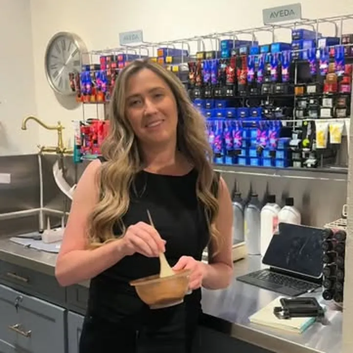 Nina Pelfini mixing Aveda color at the Salon Bilancio color bar